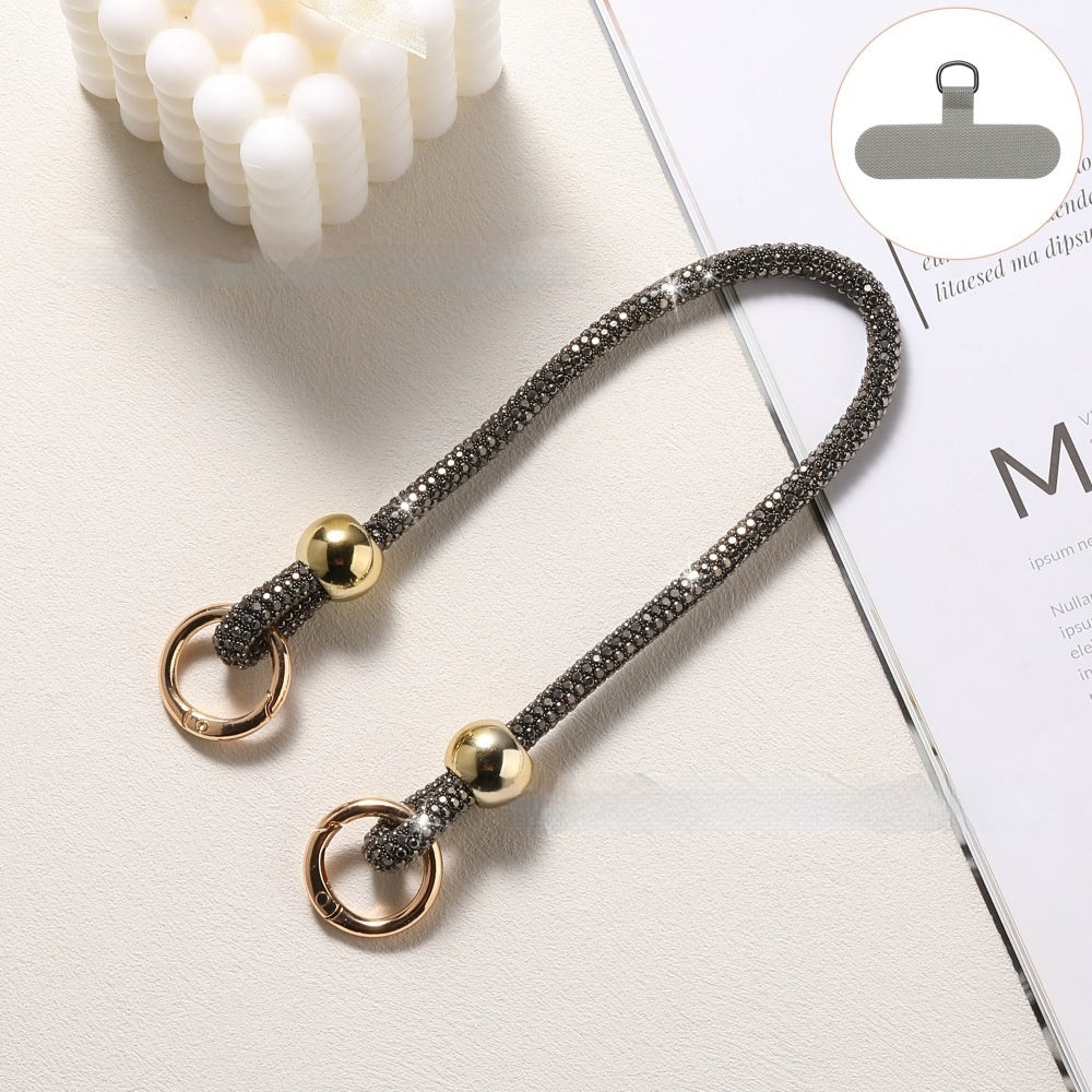Lanière Téléphone Strass Luxe ✨